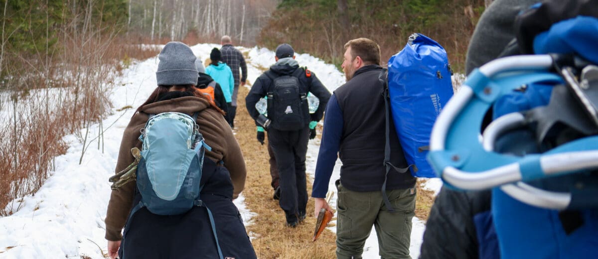 the crew heads into the woods for Wilderness Survival Training