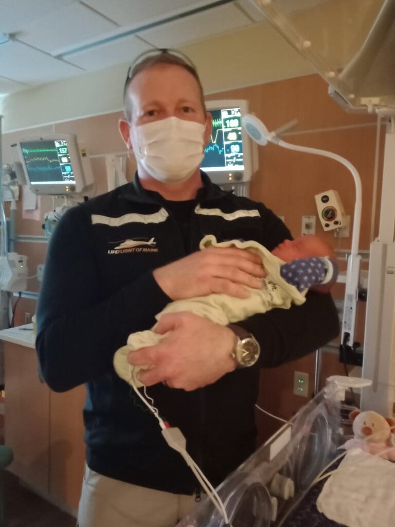 Cameron Bird with the newest member of the Roy family