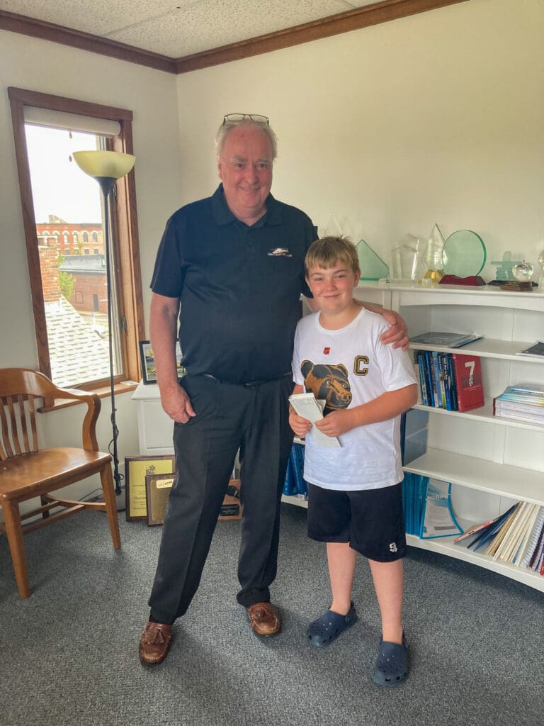 Amos Winters with Tom Judge, founding executive director of LifeFlight of Maine