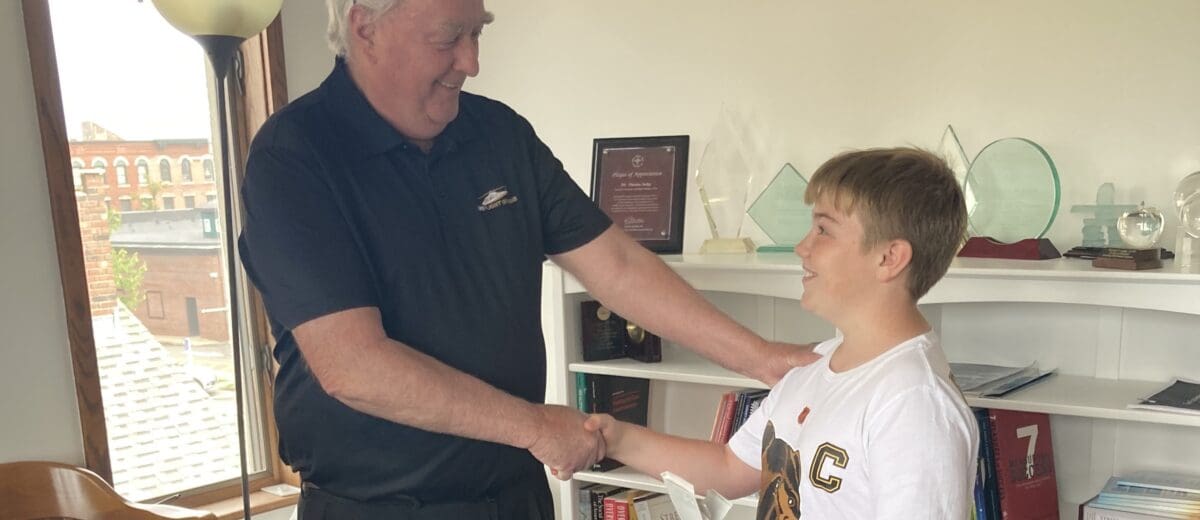 Amos Winters with Tom Judge, founding executive director of LifeFlight of Maine.