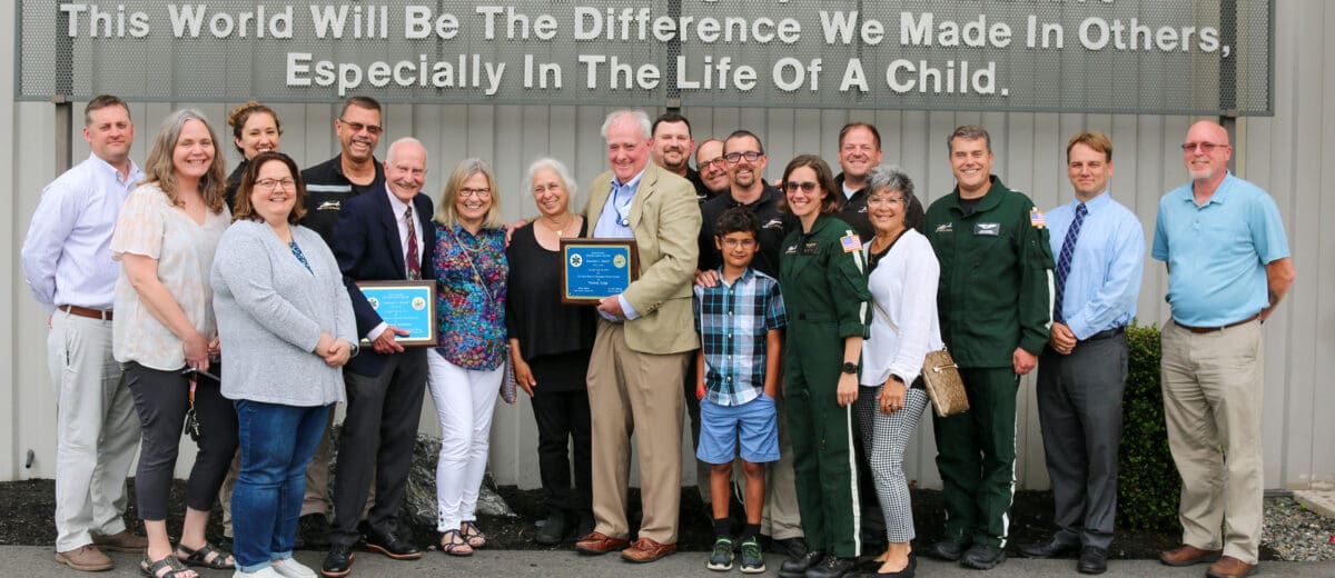 Tom Judge, Norm Dinerman, MD, and members of the LifeFlight of Maine team at the Maine EMS Governor’s Award Ceremony in Bangor, June 2023.