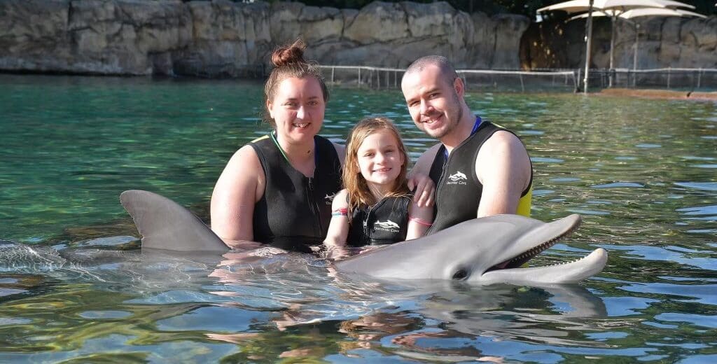 Chris Lirakis with his wife and daughter on vacation in 2023.