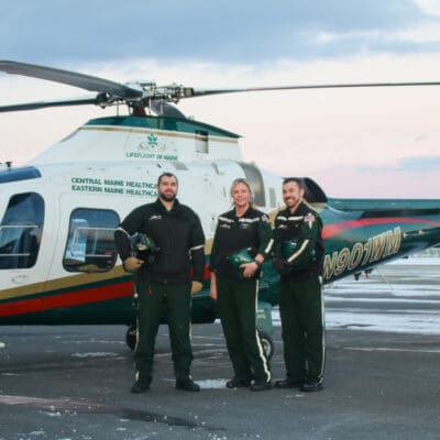 LifeFlight 4 crew in front of aircraft in Sanford