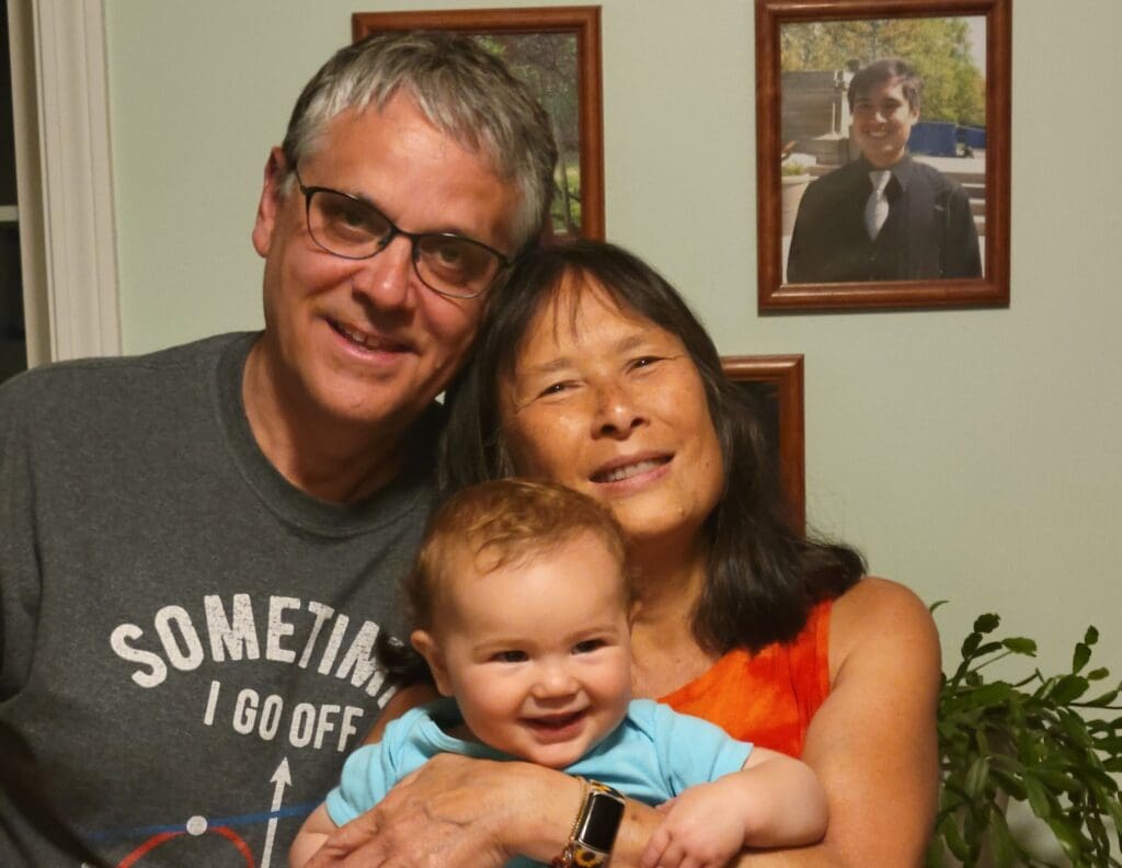 Mel Morse with her husband and grandchild