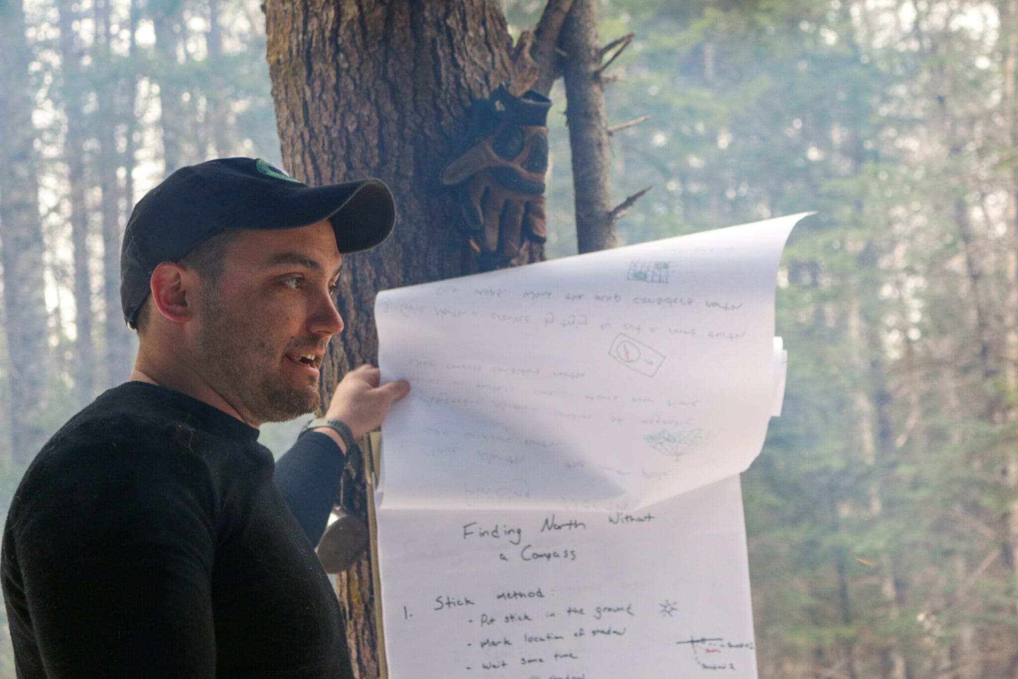 Flight paramedic Jeff Hammersmith offers instruction on land navigation using a compass and map