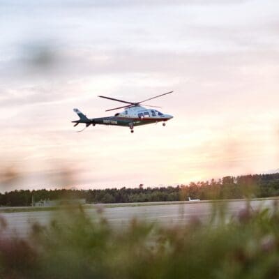 A LifeFlight of Maine helicopter above the runway.