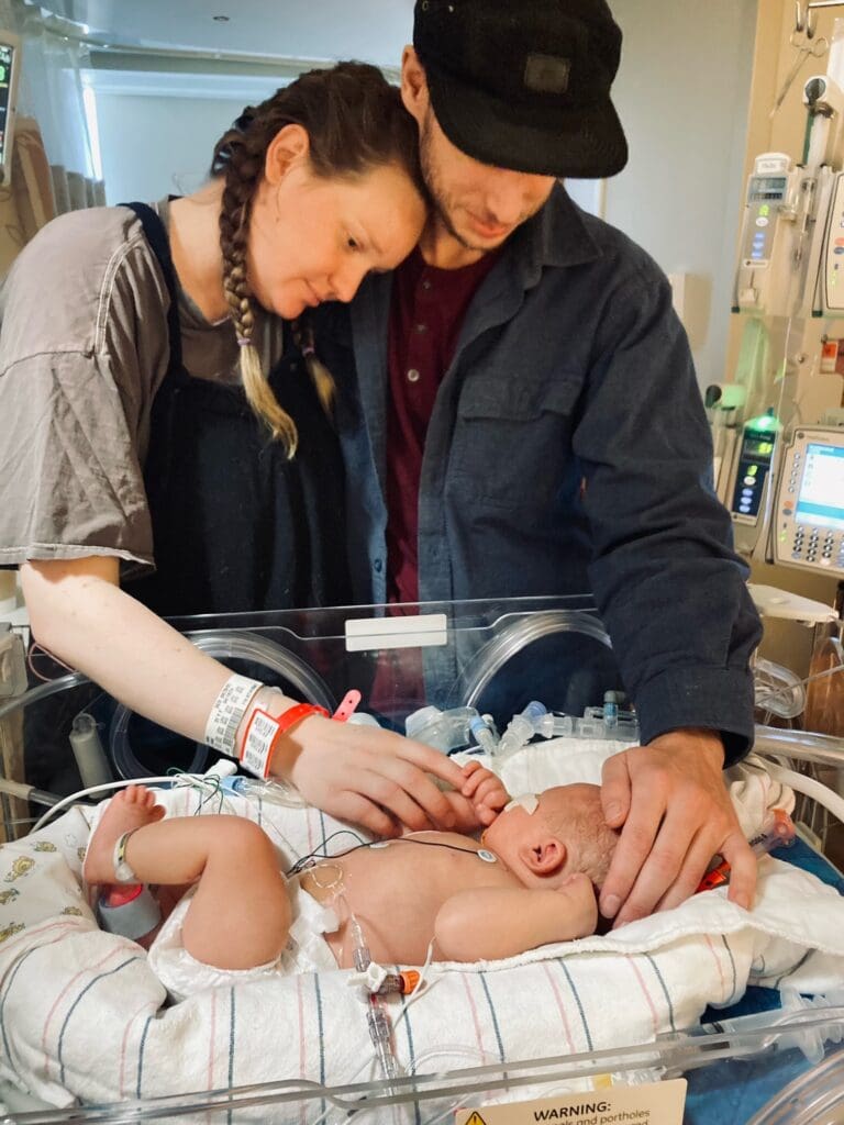 Henry as an infant with his parents, Jack and Anne.